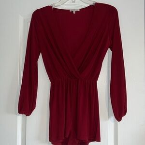 Dark red long sleeved slinky romper size XS vneck